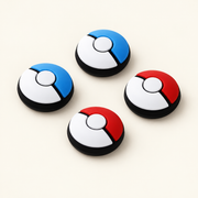 Four Retro Kid joystick caps: two red and white, two blue and white, with black rims.
