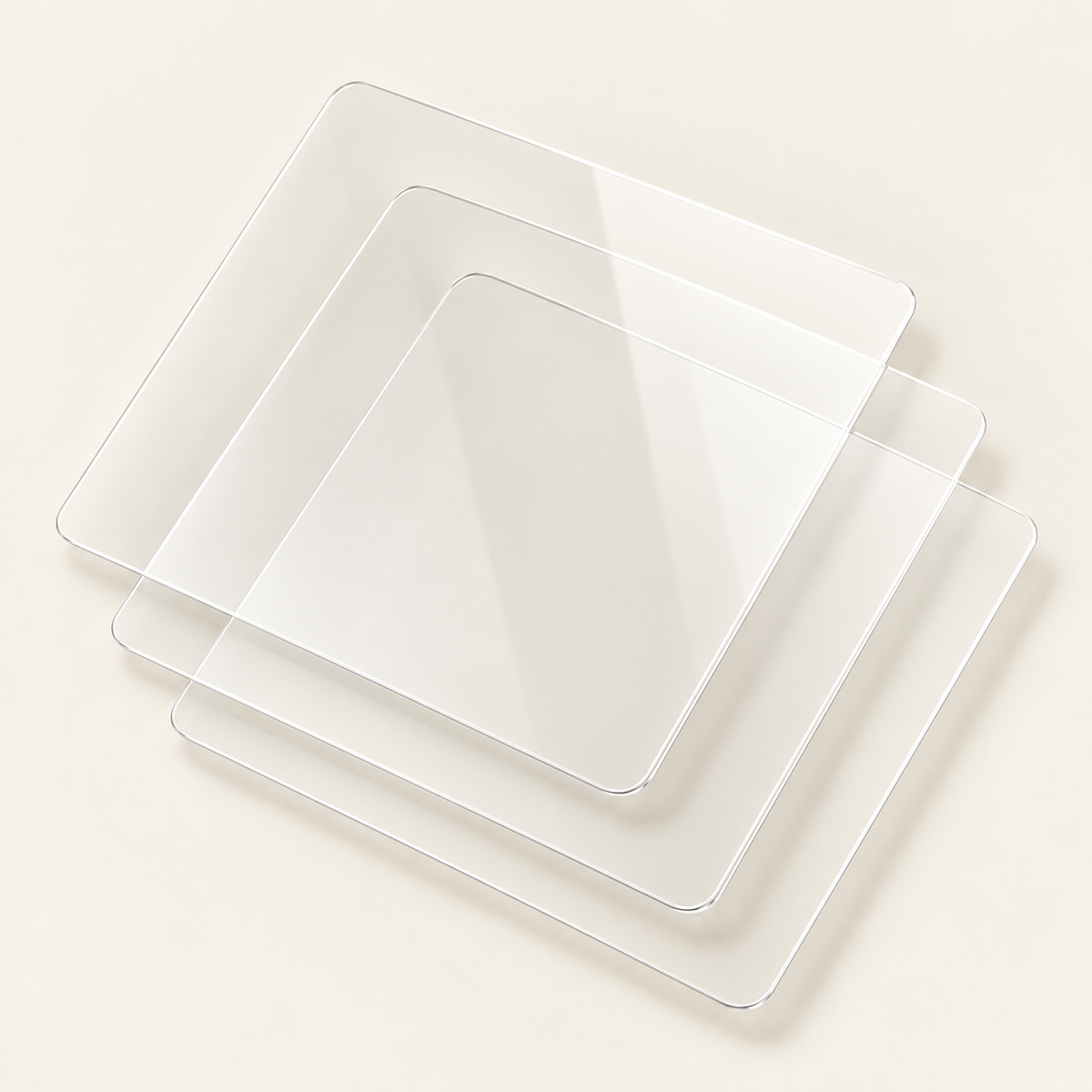 Three transparent Retro Kid tempered glass screen protectors on a cream studio background.